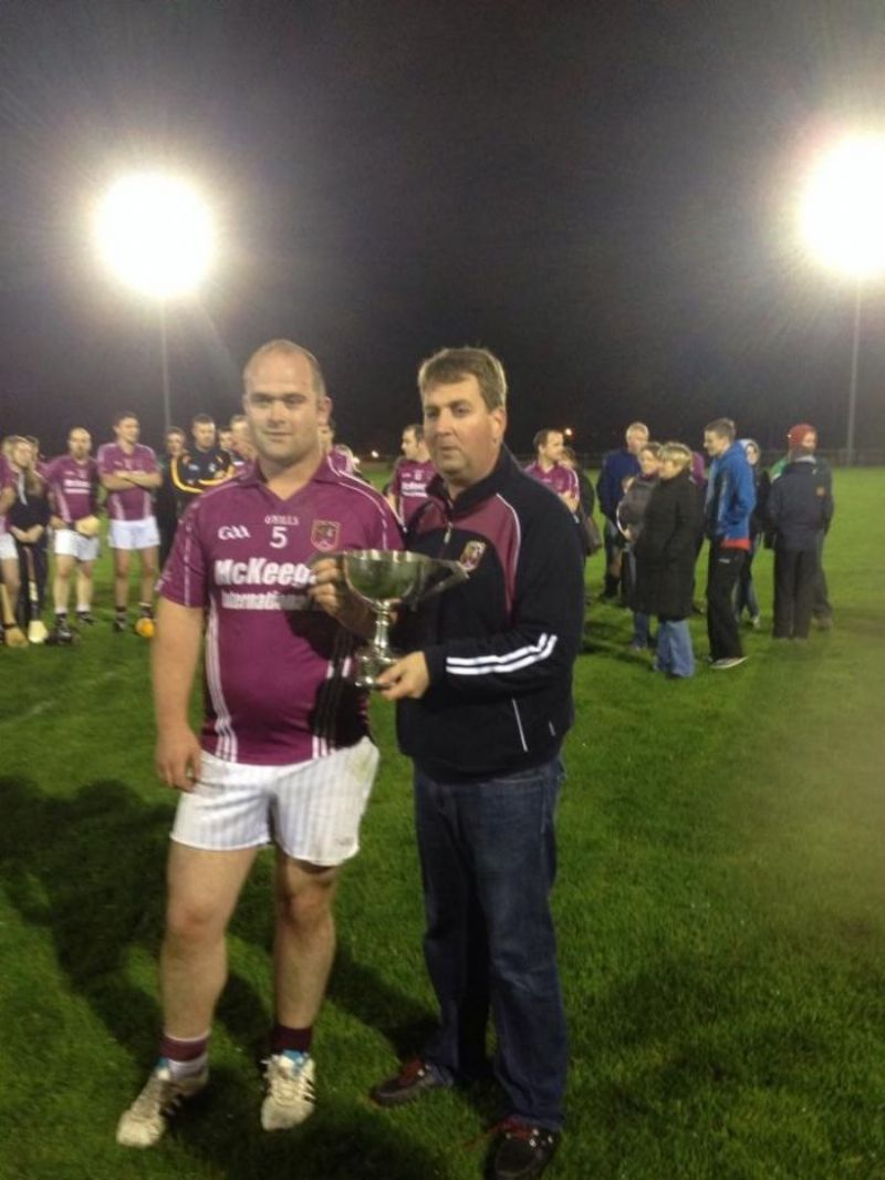 Captain Jamie Mooney collects the Junior Feis